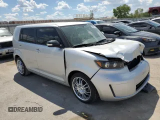 2009 Scion xB z VIN JTLKE50E491072074, wystawiony jako Copart lot #56559755 z przebiegiem Nie podano mil oraz Szkoda całkowita • Salvage title. Historia ofert i sprzedaży dostępna na DreamBid. Obrazek 4.