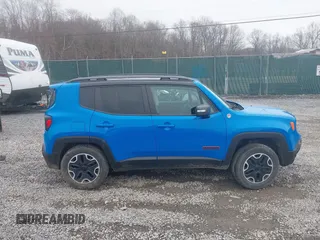 2015 Jeep Renegade Trailhawk with VIN ZACCJBCT4FPB41376, listed as a IAAI auction lot 41943388 with 65,963 mi miles and . Bid and sale history available at DreamBid. Image 14.
