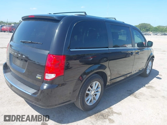 2019 Dodge Grand Caravan SXT with VIN 2C4RDGCG5KR739144, listed as a IAAI auction lot 42175888 with 43,577 mi miles and . Bid and sale history available at DreamBid. Image 4.