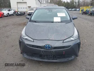 2019 Toyota Prius L Eco z VIN JTDKARFU7K3077941, wystawiony jako IAAI lot #41865759 z przebiegiem 254 612 mil mil oraz . Historia ofert i sprzedaży dostępna na DreamBid. Obrazek 12.
