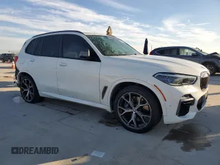 2020 BMW X5 M50i with VIN 5UXJU4C01LLE45993, listed as a Copart auction lot 88904235 with 64,841 mi miles and Salvage Title. Bid and sale history available at DreamBid. Image 4.