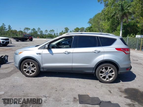 2016 Ford Escape Titanium with VIN 1FMCU0JX2GUC39416, listed as a IAAI auction lot 41793375 with 146,877 mi miles. Bid and sale history available at carsss.com. Image 14.