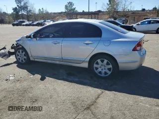 2010 Honda Civic LX with VIN 2HGFA1F51AH306669, listed as a Copart auction lot 50450825 with 143,659 mi miles and Salvage Title. Bid and sale history available at DreamBid. Image 2.