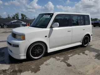 2004 Scion xB with VIN JTLKT324340167884, listed as a Copart auction lot 52494435 with 157,671 mi miles and Salvage Title. Bid and sale history available at carsss.com. Image 1.