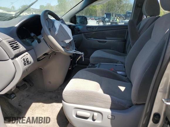 2010 Toyota Sienna CE with VIN 5TDKK4CC1AS314013, listed as a Copart auction lot 51996115 with 228,763 mi miles and Clean Title. Bid and sale history available at DreamBid. Image 7.