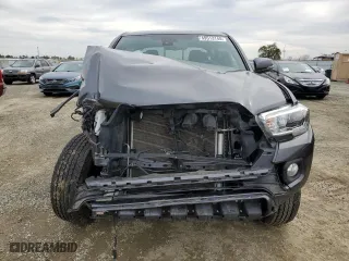 2021 Toyota Tacoma 4WD SR5 with VIN 3TMDZ5BNXMM102745, listed as a Copart auction lot 49513145 with 37,960 mi miles and Salvage Title. Bid and sale history available at carsss.com. Image 5.