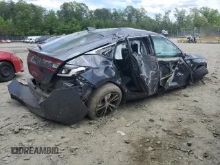 2024 Honda Civic LX z VIN 19XFL2H52RE017237, wystawiony jako Copart lot #56076635 z przebiegiem 20 999 mil mil oraz Szkoda całkowita • Salvage title. Historia ofert i sprzedaży dostępna na DreamBid. Obrazek 3.