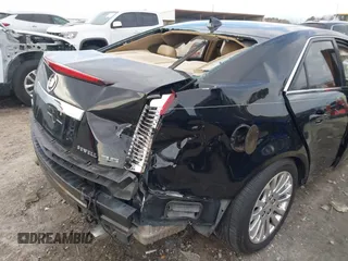 2011 Cadillac CTS Premium with VIN 1G6DP5ED2B0171652, listed as a IAAI auction lot 41229368 with 162,064 mi miles and . Bid and sale history available at DreamBid. Image 20.
