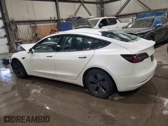 2021 Tesla Model 3 Standard Range Plus z VIN 5YJ3E1EA4MF988784, wystawiony jako Copart lot #88138765 z przebiegiem 62 438 mil mil oraz Szkody całkowita. Historia ofert i sprzedaży dostępna na DreamBid. Obrazek 2.
