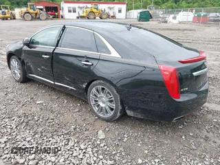 2014 Cadillac XTS Luxury with VIN 2G61M5S32E9231544, listed as a IAAI auction lot 42340088 with 74,518 mi miles and . Bid and sale history available at DreamBid. Image 3.