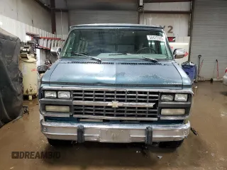 1995 Chevrolet Chevy Van z VIN 1GBEG25K2SF243949, wystawiony jako Copart lot #50422305 z przebiegiem 193 169 mil mil oraz Szkody całkowita. Historia ofert i sprzedaży dostępna na DreamBid. Obrazek 5.
