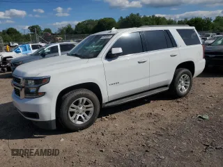 2019 Chevrolet Tahoe LT z VIN 1GNSCBKCXKR379274, wystawiony jako Copart lot #57878805 z przebiegiem 77 936 mil mil oraz Czysty tytuł • Clean title. Historia ofert i sprzedaży dostępna na DreamBid. Obrazek 1.
