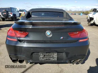 2013 BMW M6 z VIN WBSLZ9C56DDZ77892, wystawiony jako Copart lot #52102785 z przebiegiem 94 380 mil mil oraz Szkoda całkowita • Salvage title. Historia ofert i sprzedaży dostępna na DreamBid. Obrazek 6.