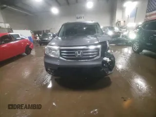 2015 Honda Pilot Touring with VIN 5FNYF4H97FB063909, listed as a Copart auction lot 51971865 with 81,609 mi miles and Salvage Title. Bid and sale history available at carsss.com. Image 14.