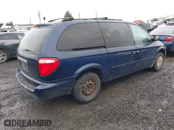 2006 Chrysler Town & Country LX with VIN 2A4GP44R46R800898, listed as a IAAI auction lot 41465720 with 215,423 mi miles and . Bid and sale history available at DreamBid. Image 4.