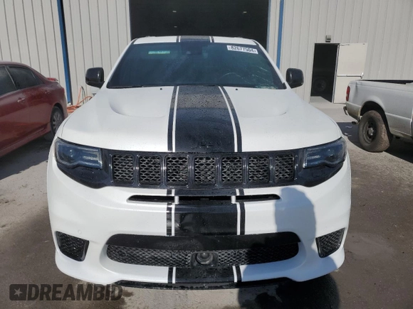 2019 Jeep Grand Cherokee Trackhawk with VIN 1C4RJFN92KC564748, listed as a Copart auction lot 82677504 with 48,528 mi miles and Salvage title. Bid and sale history available at DreamBid. Image 5.