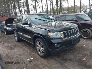 2012 Jeep Grand Cherokee Laredo with VIN 1C4RJEAG0CC316823, listed as a IAAI auction lot 41846479 with 215,317 mi miles. Bid and sale history available at carsss.com. Image 1.