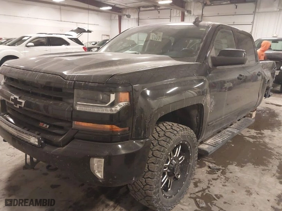 2016 Chevrolet Silverado 1500 LT with VIN 3GCUKREC3GG375664, listed as a IAAI auction lot 41377456 with 198,439 mi miles. Bid and sale history available at carsss.com. Image 2.