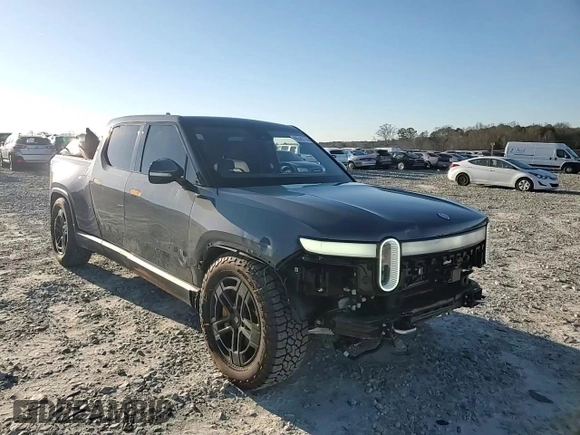 2023 Rivian R1T Adventure z VIN 7FCTGAAA1PN022134, wystawiony jako Copart lot #85545774 z przebiegiem 48 951 mil mil oraz Szkoda całkowita • Salvage title. Historia ofert i sprzedaży dostępna na DreamBid. Obrazek 11.