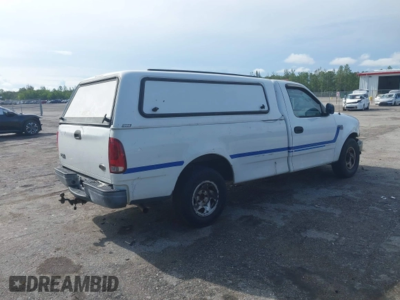 2004 Ford F-150 XL с VIN 2FTRF17W84CA14975, выставлен на аукционе IAAI как лот 42392138 с пробегом 121 799 миль миль и . История ставок и продаж доступна на DreamBid. Изображение 4.