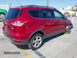 2014 Ford Escape SE with VIN 1FMCU0GX7EUD80714, listed as a IAAI auction lot 41981789 with 84,626 mi miles and . Bid and sale history available at DreamBid. Image 4.