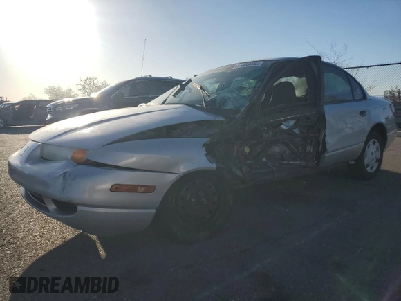 2000 Saturn SL with VIN 1G8ZH5281YZ242734, listed as a Copart auction lot 57433915 with Not provided miles and Salvage title. Bid and sale history available at DreamBid. Image 1.