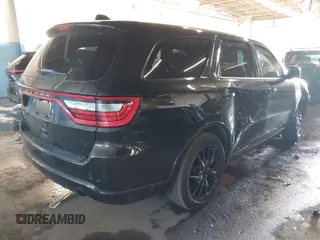 2015 Dodge Durango R/T with VIN 1C4SDJCT2FC917649, listed as a IAAI auction lot 41544709 with 118,858 mi miles and . Bid and sale history available at carsss.com. Image 4.
