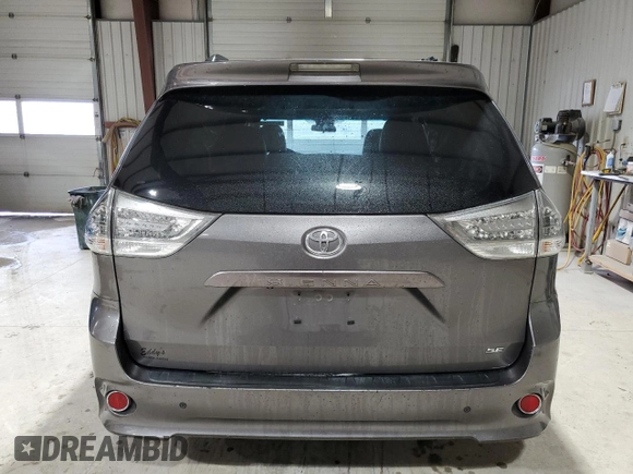 2011 Toyota Sienna SE with VIN 5TDXK3DCXBS159705, listed as a Copart auction lot 52173115 with 134,100 mi miles and Salvage Title. Bid and sale history available at carsss.com. Image 6.