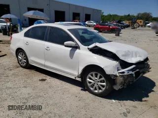 2012 Volkswagen Jetta Sedan SE w/Convenience & Sunroof with VIN 3VWDX7AJ9CM369676, listed as a Copart auction lot 53093655 with 138,564 mi miles and Salvage Title. Bid and sale history available at carsss.com. Image 4.