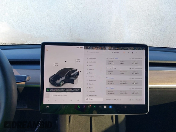 2022 Tesla Model Y Long Range with VIN 7SAYGAEE6NF361883, listed as a IAAI auction lot 41752441 with 50,493 mi miles and . Bid and sale history available at DreamBid. Image 18.