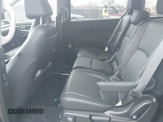 2023 Honda Odyssey Touring with VIN 5FNRL6H86PB065670, listed as a IAAI auction lot 41691093 with 22,518 mi miles and . Bid and sale history available at DreamBid. Image 8.