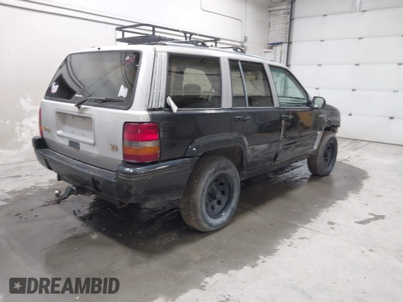 1994 Jeep Grand Cherokee Limited with VIN 1J4GZ78Y8RC165923, listed as a IAAI auction lot 42275894 with 247,977 mi miles and . Bid and sale history available at DreamBid. Image 4.
