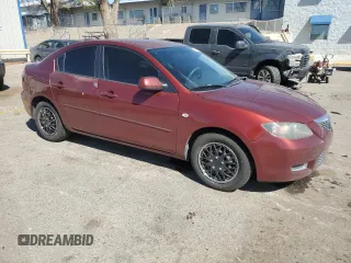 2009 Mazda 3 i Touring Value with VIN JM1BK32G991254327, listed as a Copart auction lot 49355935 with 192,433 mi miles and Salvage Title. Bid and sale history available at DreamBid. Image 4.
