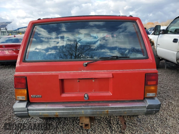 1996 Jeep Cherokee Country with VIN 1J4FJ78S5TL287631, listed as a Copart auction lot 79755834 with 195,365 mi miles and Salvage Title. Bid and sale history available at carsss.com. Image 6.