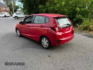 2015 Honda Fit LX with VIN 3HGGK5H50FM760104, listed as a Copart auction lot 63164915 with 118,328 mi miles and Clean title. Bid and sale history available at DreamBid. Image 3.
