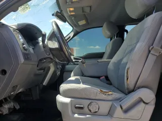 2013 Ford F-150 XL with VIN 1FTFW1EF8DFA22715, listed as a Copart auction lot 57919985 with 243,124 mi miles and Salvage title. Bid and sale history available at DreamBid. Image 7.