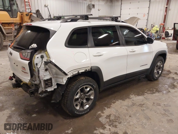 2019 Jeep Cherokee Trailhawk with VIN 1C4PJMBX4KD390061, listed as a IAAI auction lot 42007112 with 72,227 mi miles and . Bid and sale history available at DreamBid. Image 4.