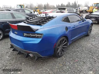 2016 Chevrolet Camaro 1LT with VIN 1G1FA1RX5G0165333, listed as a IAAI auction lot 41856530 with 118,923 mi miles. Bid and sale history available at carsss.com. Image 4.
