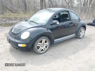 2004 Volkswagen New Beetle Coupe GL with VIN 3VWBK31CX4M416912, listed as a IAAI auction lot 42125377 with 999,999 mi miles. Bid and sale history available at carsss.com. Image 2.