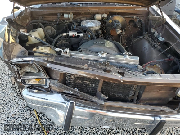 1988 Dodge D/W 100 z VIN 1B7FD04XXJS678038, wystawiony jako Copart lot #84737964 z przebiegiem 19 276 mil mil oraz Szkoda całkowita • Salvage title. Historia ofert i sprzedaży dostępna na DreamBid. Obrazek 12.