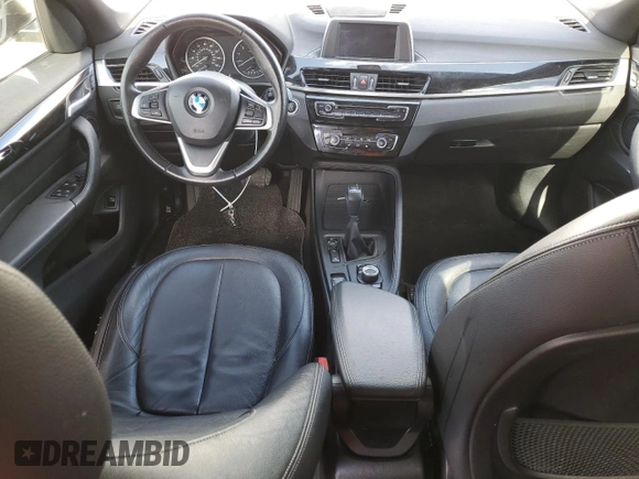 2018 BMW X1 xDrive28i with VIN WBXHT3C39J5K25722, listed as a Copart auction lot 46668855 with 63,533 mi miles and Salvage Title. Bid and sale history available at carsss.com. Image 8.