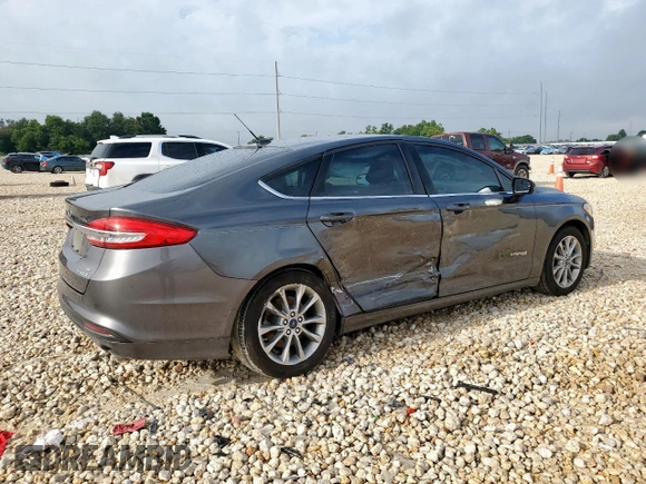 2017 Ford Fusion Hybrid SE with VIN 3FA6P0LU7HR318039, listed as a Copart auction lot 63575325 with 106,355 mi miles and Salvage title. Bid and sale history available at DreamBid. Image 3.