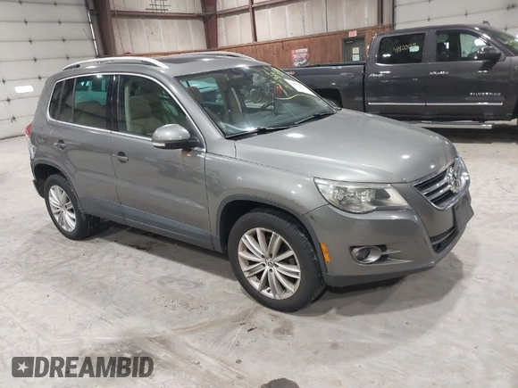 2011 Volkswagen Tiguan SE with VIN WVGBV7AX9BW524807, listed as a IAAI auction lot 41921439 with 204,813 mi miles and . Bid and sale history available at DreamBid. Image 1.