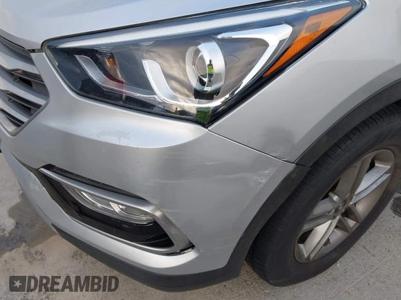 2017 Hyundai Santa Fe 2.4L with VIN 5XYZU3LB4HG464876, listed as a IAAI auction lot 42693100 with 127,888 mi miles and . Bid and sale history available at DreamBid. Image 6.