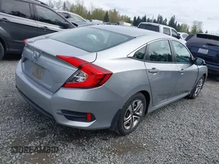 2016 Honda Civic Sedan LX with VIN 19XFC2F50GE206744, listed as a IAAI auction lot 42007430 with 49,391 mi miles. Bid and sale history available at carsss.com. Image 4.