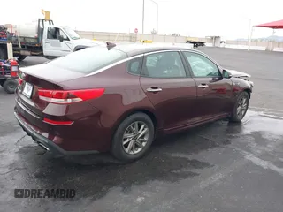 2019 Kia Optima LX z VIN 5XXGT4L38KG337200, wystawiony jako IAAI lot #41807462 z przebiegiem 126 429 mil mil oraz . Historia ofert i sprzedaży dostępna na DreamBid. Obrazek 4.