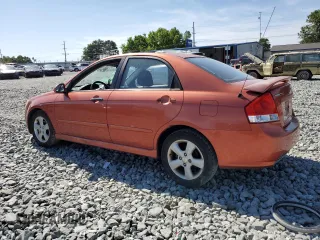 2009 Kia Spectra SX z VIN KNAFE221095025989, wystawiony jako Copart lot #57583155 z przebiegiem 261 776 mil mil oraz Szkoda całkowita • Salvage title. Historia ofert i sprzedaży dostępna na DreamBid. Obrazek 2.
