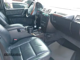 2005 Mercedes-Benz G-Class with VIN WDCYR49E25X156547, listed as a IAAI auction lot 38640157 with 241,209 mi miles. Bid and sale history available at carsss.com. Image 5.