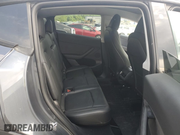 2023 Tesla Model Y Long Range z VIN 7SAYGDEE2PA041350, wystawiony jako Copart lot #56657005 z przebiegiem 25 090 mil mil oraz Szkoda całkowita • Salvage title. Historia ofert i sprzedaży dostępna na DreamBid. Obrazek 10.