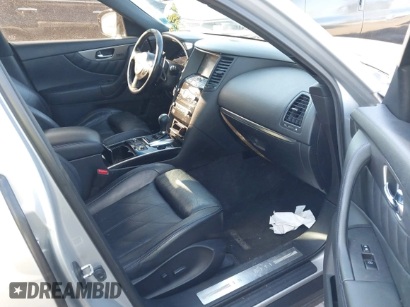 2015 Infiniti QX70 with VIN JN8CS1MW6FM482894, listed as a IAAI auction lot 41671236 with 106,599 mi miles and . Bid and sale history available at DreamBid. Image 5.